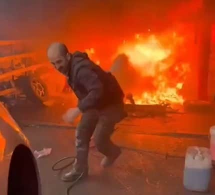 The moment a huge fire broke out at a car garage in Southall. Credit: Instagram UB1UB2