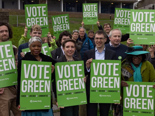 Green Party co-leaders Adrian Ramsay and Carla Denyer stand in a housing estate in Crystal Palace with party members to launch their local election campaign. Photo: Getty