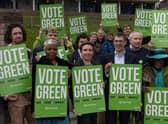 Green Party co-leaders Adrian Ramsay and Carla Denyer stand in a housing estate in Crystal Palace with party members to launch their local election campaign. Photo: Getty