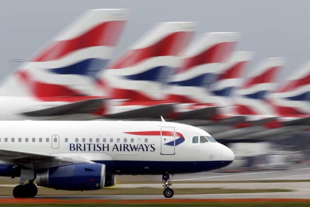 A British Airways plane lands at Heathrow Airport. (Photo by Dan Kitwood/Getty Images)