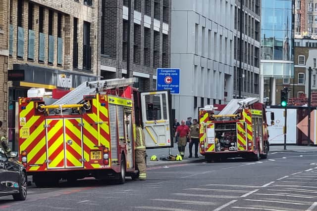 Firefighters at Commercial Road, Aldgate. Photo: LW