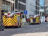 Aldgate tower block incident: Roads closed by fire brigade with steam billowing out of building