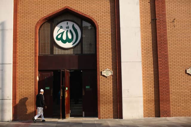 Members of the Muslim community arrive to pray at the East London Mosque for Ramadan. Credit: Dan Kitwood/Getty Images