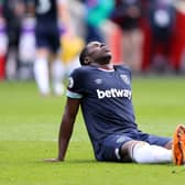 Kurt Zouma of West Ham United reacts as he appears to be injured during the Premier League match  (Photo by Warren Little/Getty Images)