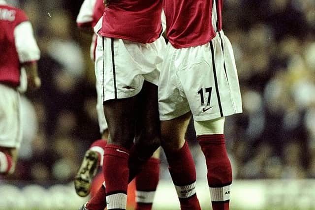 Patrick Vieira and Emmanuel Petit celebrate together at Arsenal. Credit: Phil Cole /Allsport
