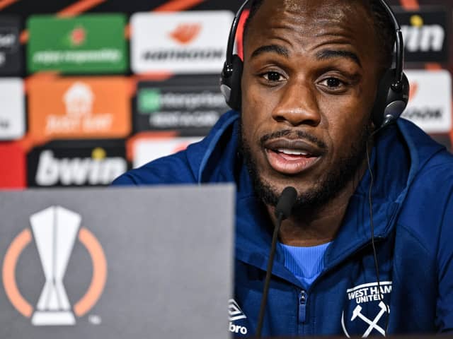 West Ham Uniteds Jamaican forward Michail Antonio answers journalists questions on the eve of the UEFA Europa League (Photo by JEFF PACHOUD/AFP via Getty Images)
