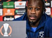 West Ham Uniteds Jamaican forward Michail Antonio answers journalists questions on the eve of the UEFA Europa League (Photo by JEFF PACHOUD/AFP via Getty Images)