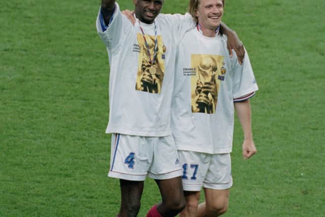 Patrick Vieira and Emmanuel Petit celebrate beating Brazil in the World Cup final. Credit: Stu Forster/Allsport/Getty Images