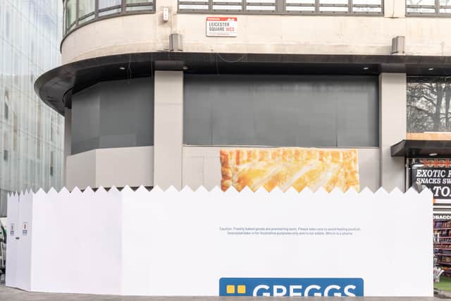 The hoardings for the new Greggs store to be opened in Leicester Square, London. Credit: SWNS