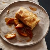 Blini (Russian pancakes) stuffed with apricot tvorog