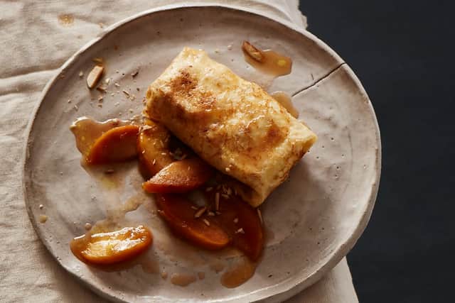 Blini (Russian pancakes) stuffed with apricot tvorog