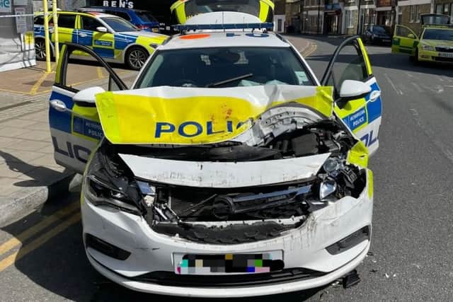 The wreckage of the police car. Credit: UB1UB2