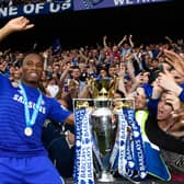  Didier Drogba of Chelsea celebrates with fans and the trophy  after the Barclays Premier League match (Photo by Mike Hewitt/Getty Images)