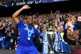  Didier Drogba of Chelsea celebrates with fans and the trophy  after the Barclays Premier League match (Photo by Mike Hewitt/Getty Images)