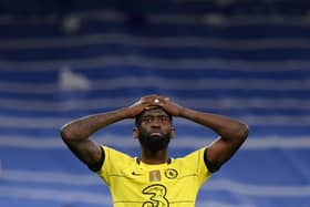 Chelsea's German defender Antonio Ruediger reacts at the end of the UEFA Champions League quarter final (Photo by OSCAR DEL POZO/AFP via Getty Images)