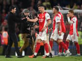 Mikel Arteta celebrates with Granit Xhaka of Arsenal after their sides victory during the Premier League  (Photo by Mike Hewitt/Getty Images)