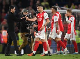 Mikel Arteta celebrates with Granit Xhaka of Arsenal after their sides victory during the Premier League  (Photo by Mike Hewitt/Getty Images)