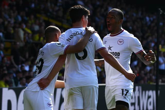 Christian Norgaard of Brentford celebrates with teammates Bryan Mbeumo and Ivan Toney after (Photo by Luke Walker/Getty Images)
