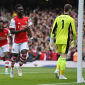 Bukayo Saka of Arsenal celebrates after scoring their side's second goal during the Premier League match (Photo by Mike Hewitt/Getty Images)