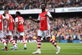  Bukayo Saka of Arsenal celebrates after scoring their side's second goal during the Premier League match  (Photo by Mike Hewitt/Getty Images)