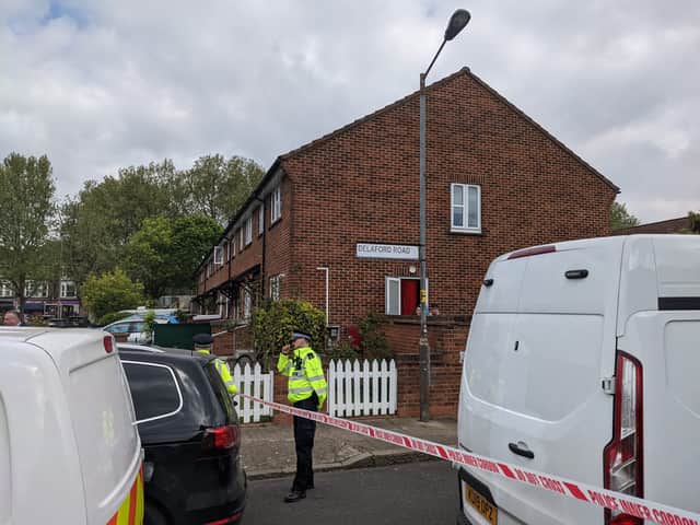 Officers at the police cordon in Delaford Road, South Bermondsey, where four people were killed in the early hours of this morning. Credit: Lynn Rusk