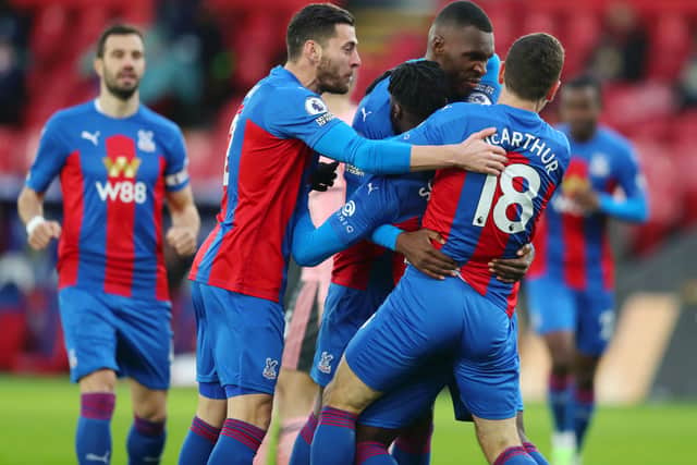  Jeffrey Schlupp of Crystal Palace celebrates with teammates after scoring their team’s first goal (Photo by Catherine Ivill/Getty Images)