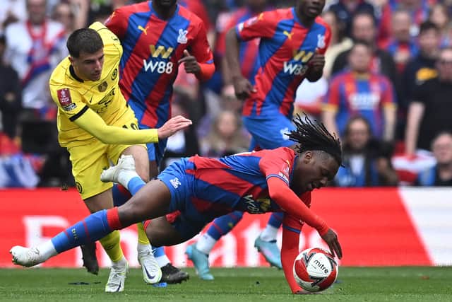 Eberechi Eze is tackled by Chelsea's English midfielder Mason Mount (L) during the English FA Cup  (Photo by BEN STANSALL/AFP via Getty Images)