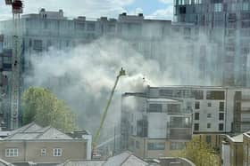 Firefighters are tackling an “intense fire” on the roof of a block of flats in Deptford. Photo: Marilyn DiCara