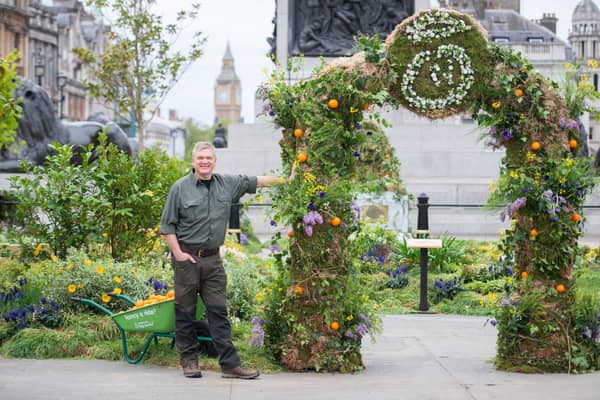 Ray Mears stands in a wild Trafalgar Square, as it is covered in plants and flowers to launch innocent Drinks’ The Big Rewild campaign. Credit: SWNS
