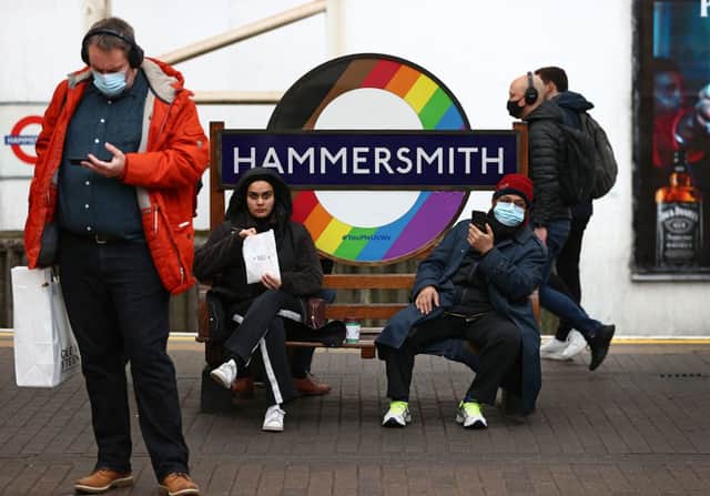 Passengers in Hammersmith. Credit: ADRIAN DENNIS/AFP via Getty Images