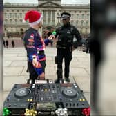 Video grab of Zachary Sabri, who goes by the DJ name ‘SUAT’, being confronted by police outside Buckingham Palace. Credit:  Zachary Sabri / SWNS