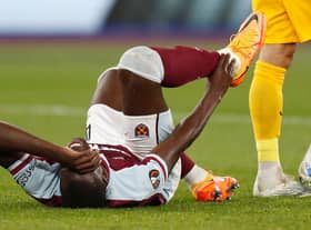 Kurt Zouma holds his ankle during the UEFA Europa League semi-final first leg  (Photo by Ian Kington / IKIMAGES / AFP) (Photo by IAN KINGTON/IKIMAGES/AFP via Getty Images)