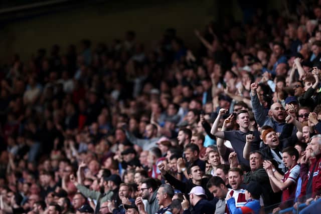 West Ham United fans show their support during the Premier League match (Photo by Ryan Pierse/Getty Images)
