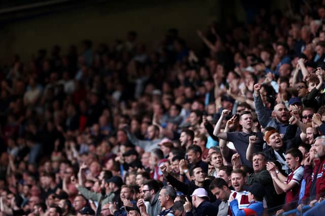  West Ham United fans show their support during the Premier League match  (Photo by Ryan Pierse/Getty Images)