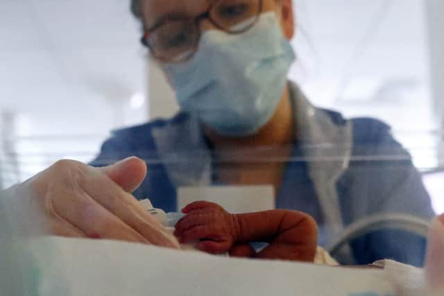 Stock image of a neonatal nurse caring for a premature baby in an incubator in hospital. Photo: Getty
