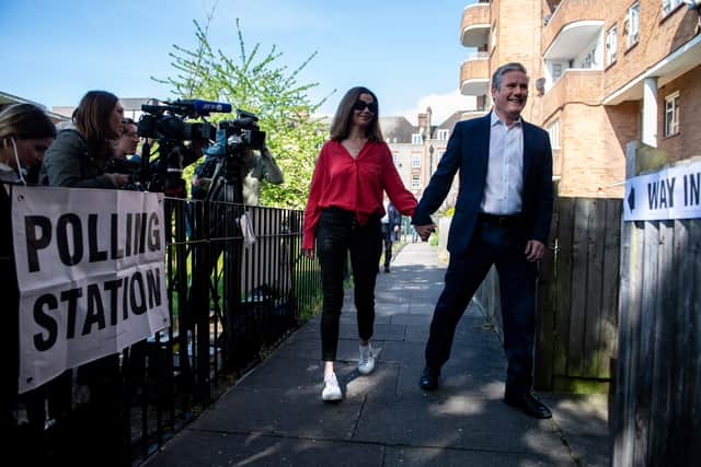 Labour leader Sir Keir Starmer arrives with his wife Victoria to cast his vote at a polling station on May 5, 2022 in London, United Kingdom. Photo: Getty