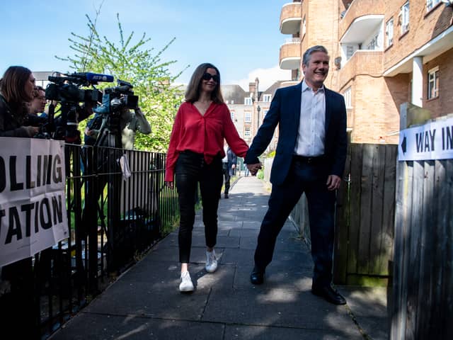 Labour leader Sir Keir Starmer arrives with his wife Victoria to cast his vote at a polling station on May 5, 2022 in London, United Kingdom. Photo: Getty
