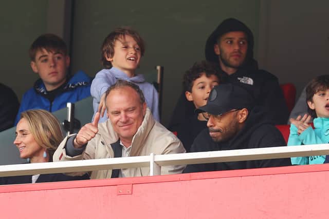 Ex-Arsenal players Dennis Bergkamp and Thierry Henry. Credit: Catherine Ivill/Getty Images