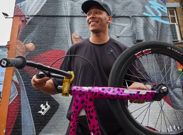 <p>Olympic medallist Kye Whyte in front of his new mural in Peckham. Credit: Gymshark</p>