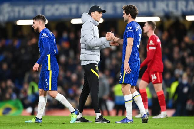Thomas Tuchel, Manager of Chelsea embraces Marcos Alonso after the Premier League match (Photo by Shaun Botterill/Getty Images)