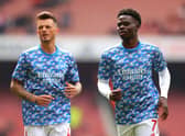 Ben White and Bukayo Saka of Arsenal warm up prior to the Premier League match  (Photo by Catherine Ivill/Getty Images)