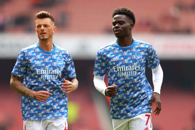 Ben White and Bukayo Saka of Arsenal warm up prior to the Premier League match  (Photo by Catherine Ivill/Getty Images)