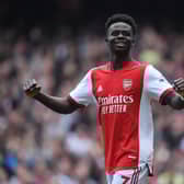 Bukayo Saka celebrates scoring the 2nd Arsenal goal during the Premier League match (Photo by Stuart MacFarlane/Arsenal FC via Getty Images)