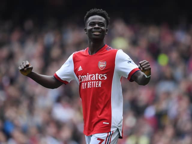 Bukayo Saka celebrates scoring the 2nd Arsenal goal during the Premier League match (Photo by Stuart MacFarlane/Arsenal FC via Getty Images)