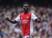 Bukayo Saka celebrates scoring the 2nd Arsenal goal during the Premier League match (Photo by Stuart MacFarlane/Arsenal FC via Getty Images)