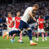 Harry Kane of Tottenham Hotspur celebrates after scoring their side's first goal during the Premier League  (Photo by Mike Hewitt/Getty Images)