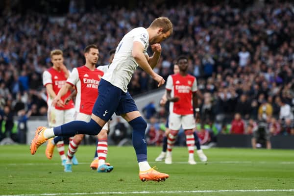  Harry Kane of Tottenham Hotspur celebrates after scoring their side's first goal during the Premier League  (Photo by Mike Hewitt/Getty Images)