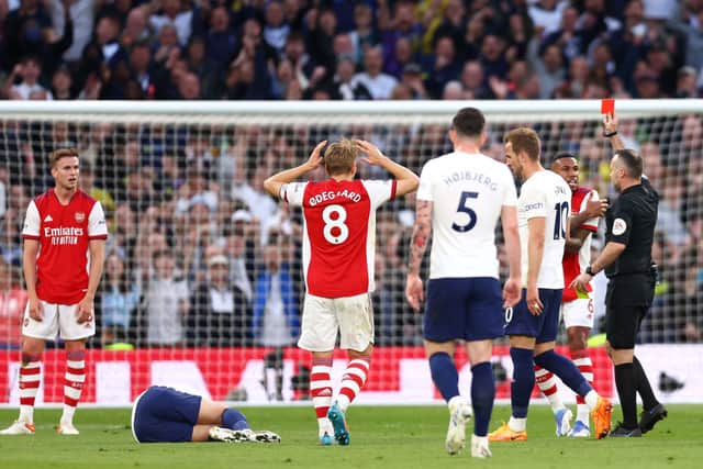 Rob Holding of Arsenal is shown a red card following a foul on Heung-Min Son of Tottenham Hotspur. Credit: Clive Rose/Getty Images