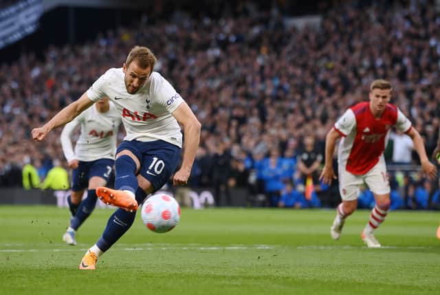 Harry Kane of Tottenham Hotspur scores their side's first goal from the penalty spot (Photo by Mike Hewitt/Getty Images)