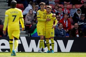 Kai Havertz (C) celebrates with Chelsea's German striker Timo Werner (R) after scoring the fourth goal  (Photo by ADRIAN DENNIS/AFP via Getty Images)